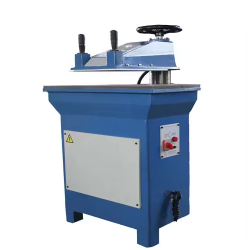 Hydraulic Clicking Swing-Arm Cutting Press Model TW-922(1+1) with a Bright Orange Pivoting Arm Mounted on a Sturdy Olive-Green Steel Frame. Features a Spacious RectangularWorktable, Dual-Hand Safety Controls on the Arm, and an Integrated Hydraulic Pump Housed in the Base, Designed for Precision Die cutting of Leather, Rubber, Fabric, and Similar Materials