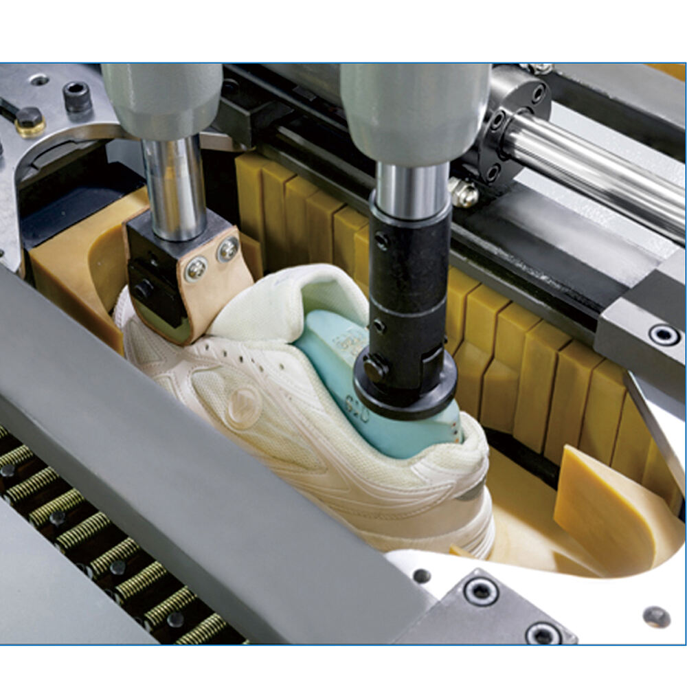 TH-710E double station heavy-duty walled sole attaching machine with 16 side pressure rubber pads for uniform and efficient shoe sole bonding. TH-710E double station heavy-duty walled sole attaching machine with 16 side pressure rubber pads for uniform and efficient shoe sole bonding.