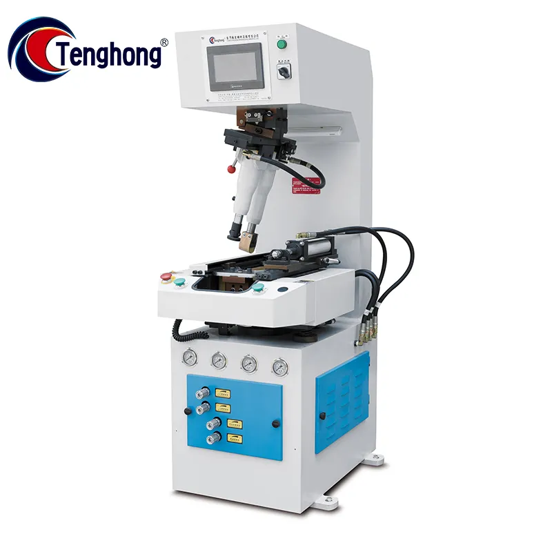 TH-710D PLC-controlled single station heavy-duty walled sole attaching machine designed for precise and reliable shoe sole bonding. TH-710D PLC-controlled single station heavy-duty walled sole attaching machine designed for precise and reliable shoe sole bonding.