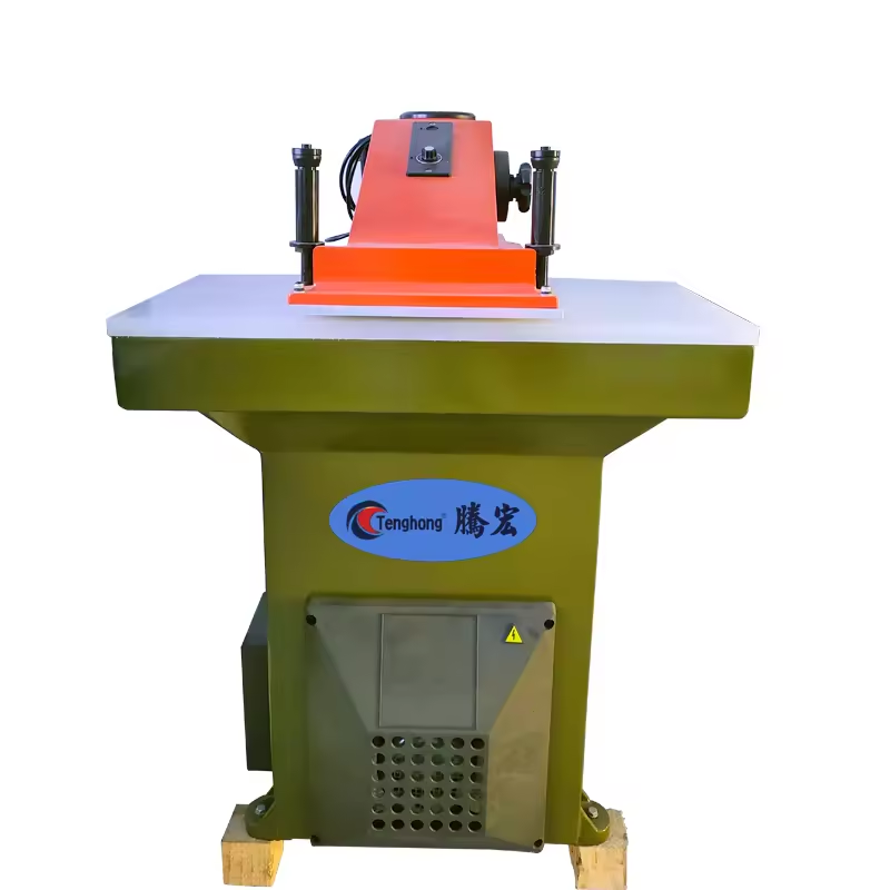 TH-228 Hydraulic Swing Arm Cutting Machine designed for accurate cutting of leather and other materials using a hydraulic-powered swing arm mechanism. TH-228 Hydraulic Swing Arm Cutting Machine designed for accurate cutting of leather and other materials using a hydraulic-powered swing arm mechanism.