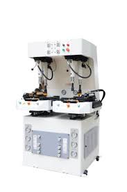 TW-687MB computerized full automatic cementing toe lasting machine with advanced robotic arms, precision cementing system, hydraulic toe pressing unit, and digital control panel for high-efficiency footwear manufacturing. TW-687MB computerized full automatic cementing toe lasting machine with advanced robotic arms, precision cementing system, hydraulic toe pressing unit, and digital control panel for high-efficiency footwear manufacturing.