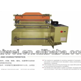 TW-600D punching machine with precision die-cutting system and automated controls, designed for accurate hole punching in leather, fabric, and industrial materials.